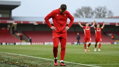 Cliftonville FC manager Jim Magilton said his team failed to show up in a 2-0 defeat at Larne, a result that leaves them...